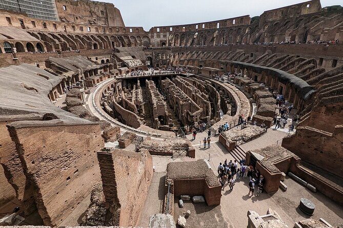 Colosseum and Roman Forum Private Tour - Entering The Colosseum with skip-the-queue access